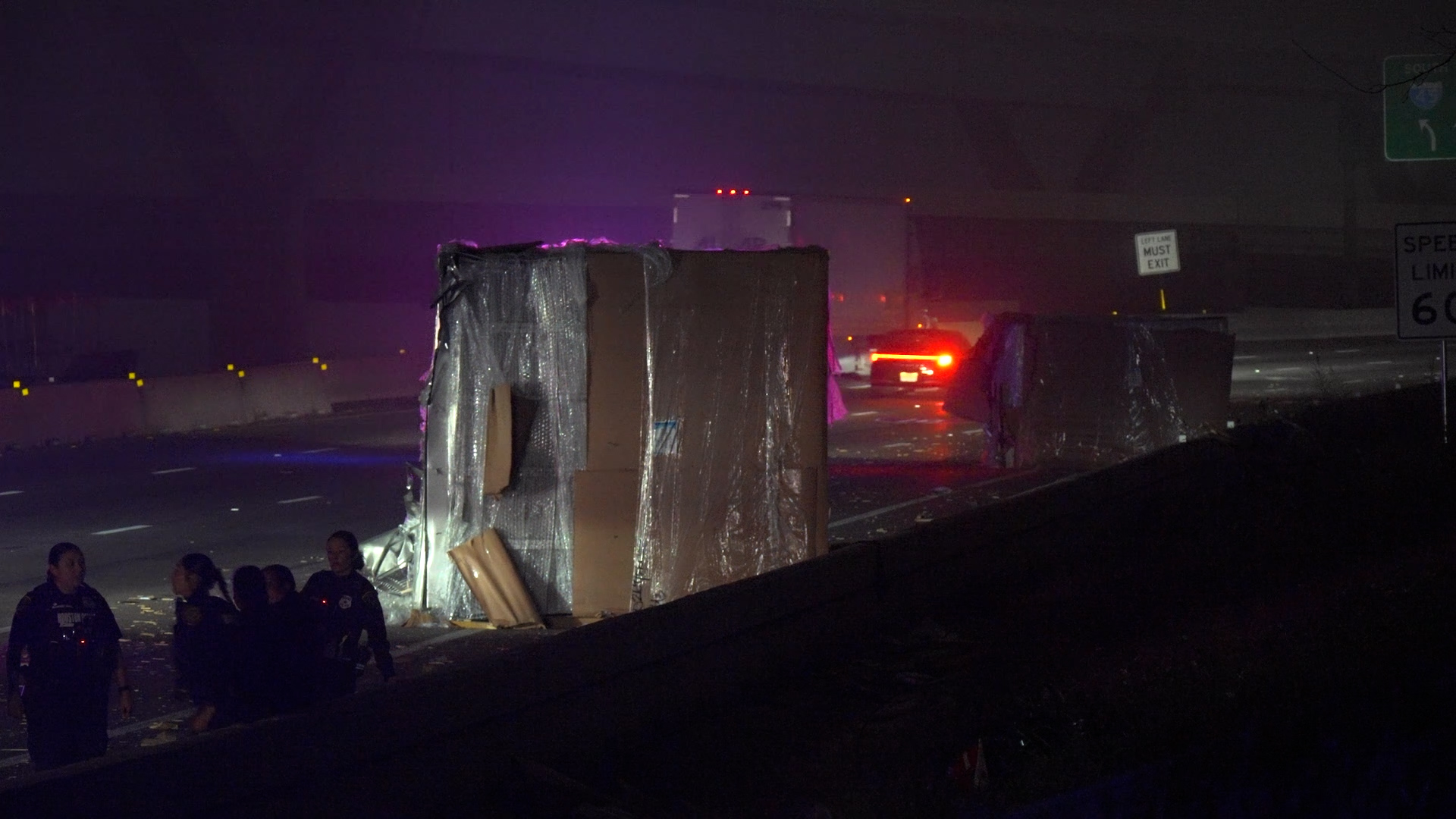 Boxes fall from truck after striking Houston Avenue Bridge on IH-10 ...
