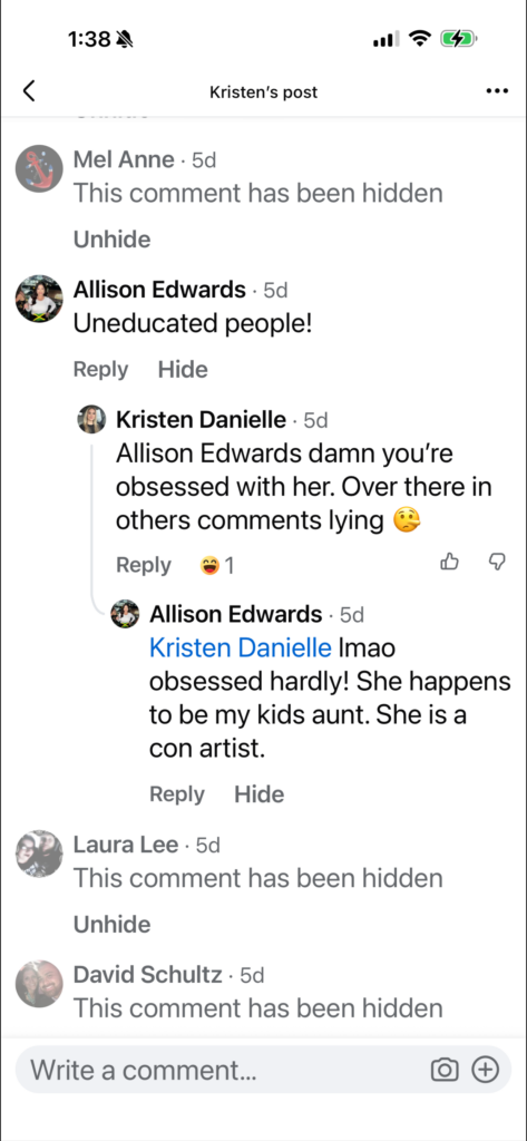 Mobile screenshot of a social media post's comment thread showing hostile remarks and a reply chain.